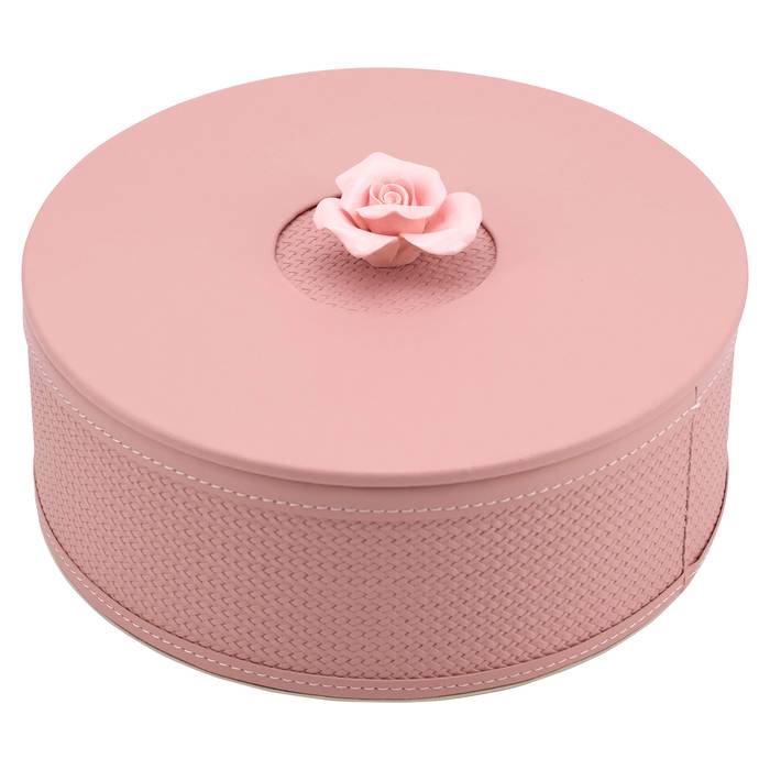 Die Aufbewahrungsbox Mary klein (rosa) hat ein elegantes und modernes Design. Auf der Oberseite befindet sich eine kunstvoll gestaltete Rose, die als Griff zum Öffnen der Box dient.