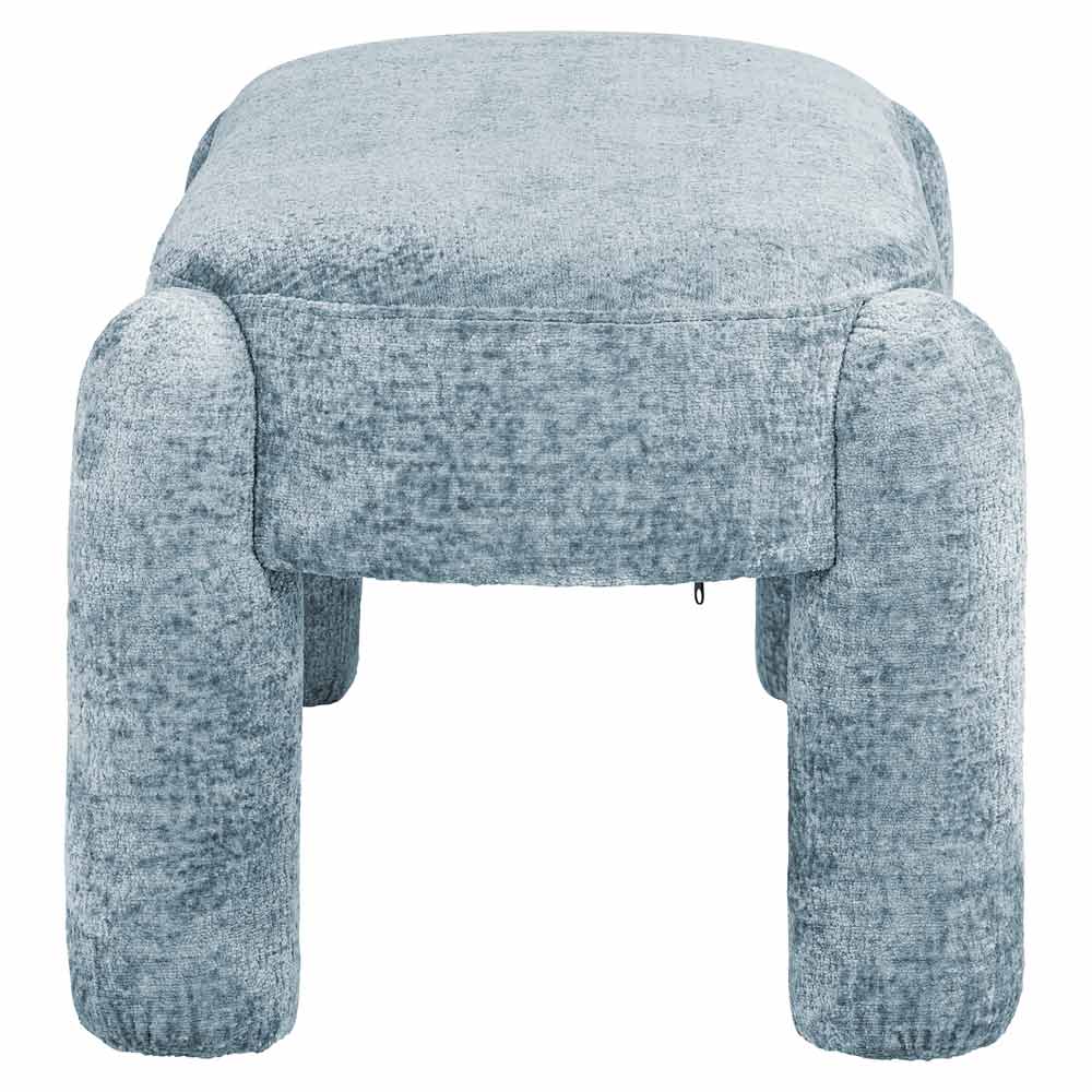 Plüschiger, gepolsterter Hocker mit strukturiertem Stoff in Blautönen. Modernes, minimalistisches Design ohne sichtbare Beine. Ideal als Sitzgelegenheit oder Fußstütze