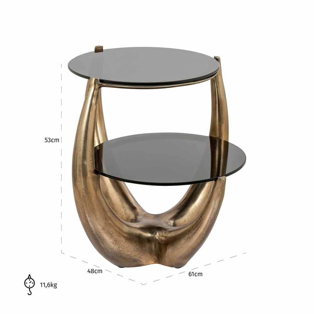 Zweistufiger, runder Beistelltisch mit Glasplatten. Das Gestell hat eine skulpturale Form in Goldfinish. Maße: 53 cm hoch, 46 cm breit, 61 cm lang. Gewicht: 31,6 kg.
